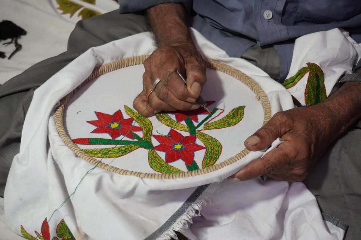 Elegant Chahek attire in rich fabric tones
